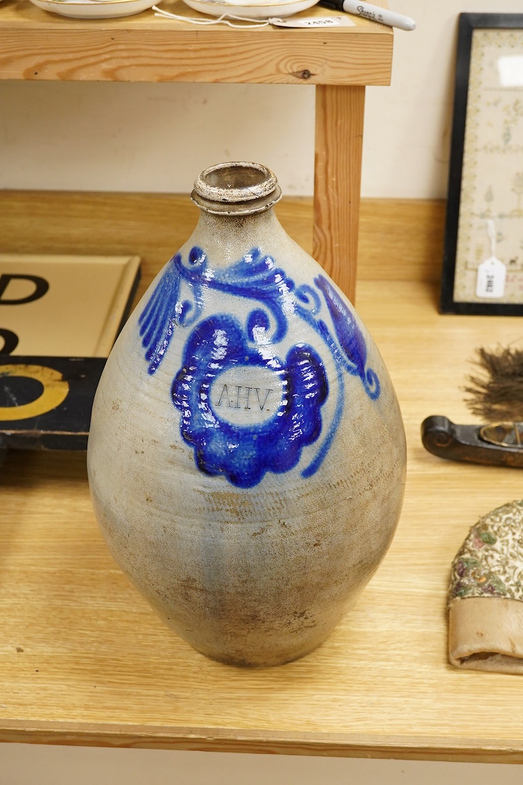 A large European salt glazed stoneware flagon, 43cm high